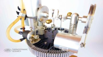 Finned, water-cooled Stirling engine generator